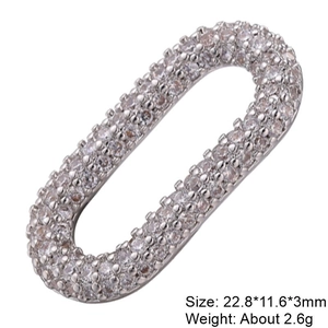 Macro detail of silver oval jewelry clasp with micro-set zircon for DIY bracelets