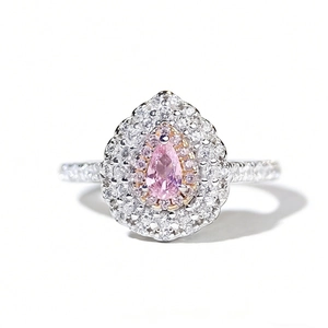 Elegant S925 sterling silver ring with a pear-cut pink gemstone and double halo setting