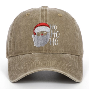 Macro shot of Santa Claus embroidery and HO HO HO text on washed cotton baseball cap
