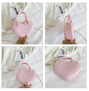 Detail view of heart-shaped pink jelly crossbody bag with metallic chain in four angles