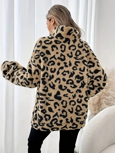 Back view of leopard print fleece jacket with soft plush texture and high neck style