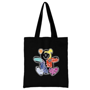 Black canvas shoulder bag with a colorful graffiti bear print on white background