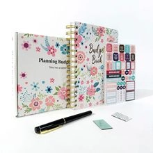 Detail view of floral budget planning set with spiral book, notepad and sticker sheet