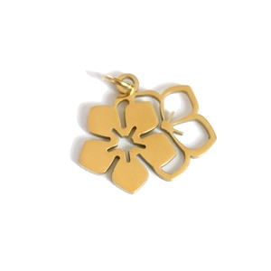 Detailed view of a gold floral pendant featuring layered hollow flower petals for jewelry