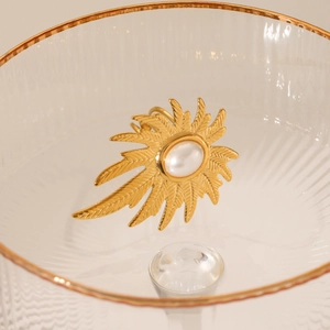 Exaggerated golden leaf texture open ring with white oval pearl stone center