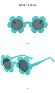 Detail of green and black sunflower shaped sunglasses showing front and side views