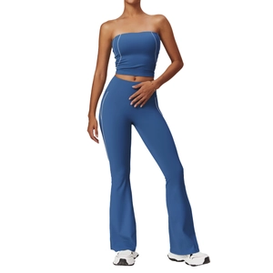 Navy blue yoga set with contrast stitching, including tube top and flared leggings