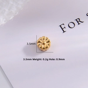 Detailed macro view of 3.5mm golden petal spacer bead with dimensions and weight info
