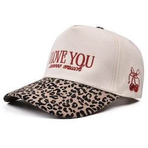 Detail shot of I Love You sooooo much embroidery and red cherry on leopard brim cap