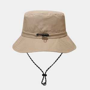 Detail of adjustable windproof drawcord and quick-dry fabric on khaki sun bucket hat