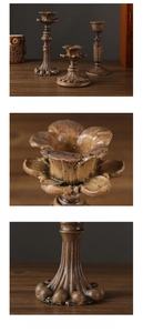 Detail view of vintage resin candle holder with ornate carvings and distressed bronze finish