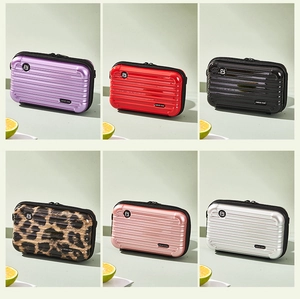 Detailed grid view of mini hardshell crossbody bags in purple red black leopard and metallic colors