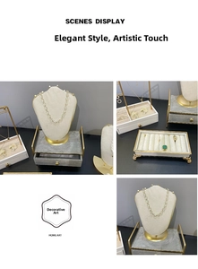 Detailed jewelry display set featuring golden metal frames with beige velvet lining inserts