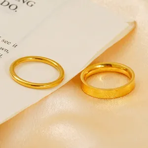 Minimalist 18k gold plated stainless steel rings with a polished finish and sleek design