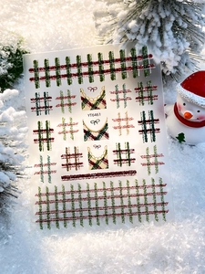 Detailed view of YT6461 Christmas nail stickers with red and green plaid and bow patterns