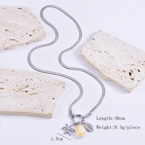 Detail view of 46cm silver snake chain necklace with floral and leaf pendants
