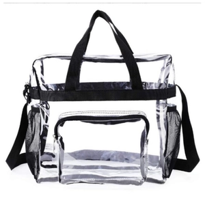 Large transparent PVC travel tote bag with black nylon straps and side mesh pockets