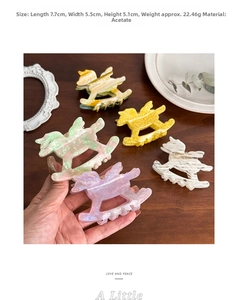 Detail showing dimensions of horse-shaped acetate hair claw clips in various colors