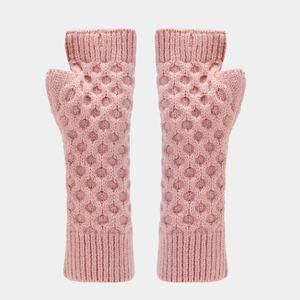 Detailed view of pink chunky knit fingerless gloves with honeycomb textured pattern