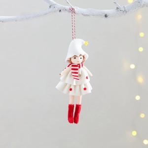 Plush Christmas girl pendant hanging on tree branch with cozy white and red scarf accessory