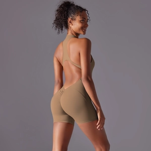 Detail view of backless one-piece yoga jumpsuit with scrunch butt lifting design