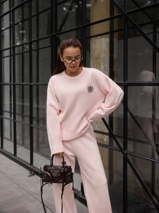 Pink knit two-piece set for women featuring embroidered sweater and wide-leg pants