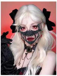 Detailed view of Gothic black fanged mask with lace cross choker for Halloween parties