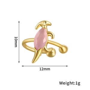 Detailed view of 18K gold dinosaur ear cuff with pink stone inlay and size dimensions