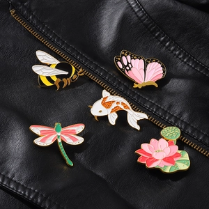 Exquisite enamel animal and flower pins set featuring bee, butterfly and koi on black leather