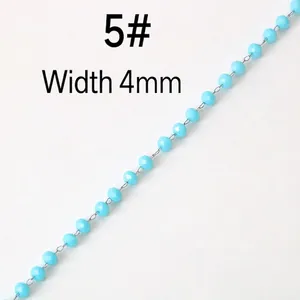 Macro detail of 4mm sky blue faceted crystal bead chain for DIY jewelry accessories