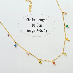 Detail view of gold necklace with colorful beads showing 40+5cm length and 5.4g weight
