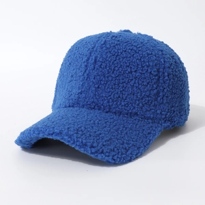Thick navy blue sherpa fleece baseball cap with warm teddy fur texture for winter wear