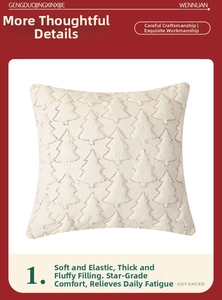 Detail of Christmas tree pattern embroidery on a thick plush cream decorative pillow case