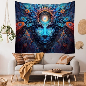 Close-up of psychedelic mushroom tapestry with mandala face design in blue and orange hues