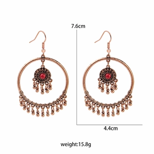 Detailed view of bohemian hoop earrings with dimensions 7.6cm by 4.4cm and weight 15.8g