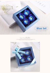 Detail of four blue and white gradient soap roses in a premium square window gift box