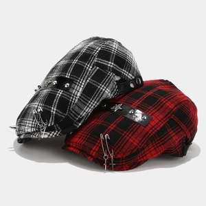 Punk style checkered beret hats with metal rivets and cross pendants in red and black