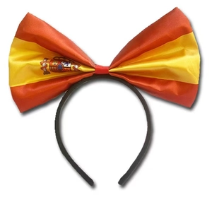 Spanish flag bow headband with classic red and yellow stripes and emblem on white background