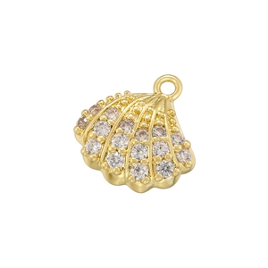Golden seashell pendant featuring clear zircon inlay and circular ring for jewelry making
