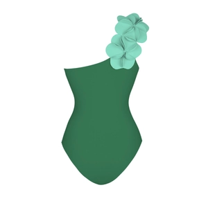 Detail view of 3D mint floral applique on a one-shoulder deep green swimsuit