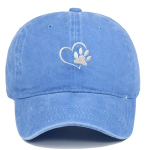 Washed blue cotton baseball cap featuring embroidered white heart and paw print design