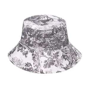 Wide brim bucket hat with ink wash jungle animal pattern and elephant toile print