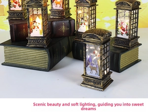 Detail of vintage Christmas telephone booth lanterns with snowman and Santa illustrations