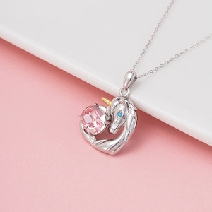 Unicorn heart pendant necklace with pink crystal stone and silver chain for women