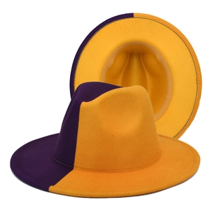 Detail view of the purple and yellow two-tone gradient fedora with flat wide brim