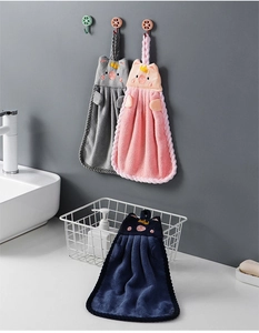 Hanging pig hand towels in pink, grey, and navy soft coral fleece for kitchen use