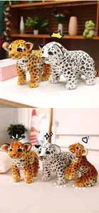 Realistic leopard and snow leopard plush toys in standing poses with soft spotted fur