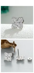 Detailed macro view of silver square cross stud earring with zircon and screw back