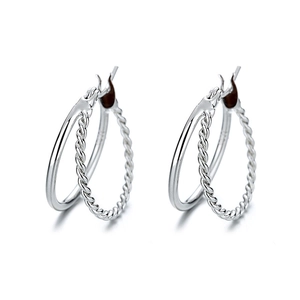Exaggerated silver S925 sterling silver twist hoop earrings with geometric double layer design