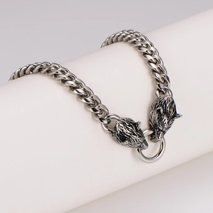 Vintage stainless steel wolf head bracelet with heavy Cuban chain and ring clasp